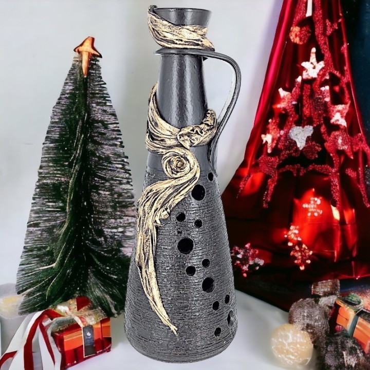Black vase with fabric application
