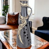 Black vase with fabric application