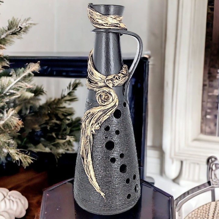 Black vase with fabric application