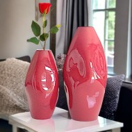 2 bordeaux dented vases