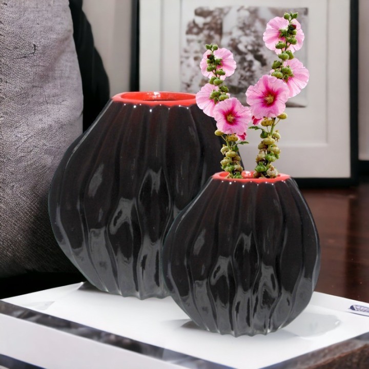 2 round maroon vases