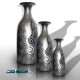 Trio of silvery vases with snails