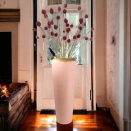 Ceramic vase in pastel pink with golden detail
