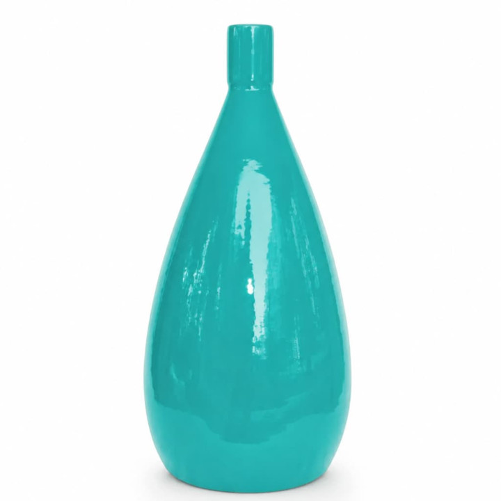 Silhouette of turquoise glazed spout vase