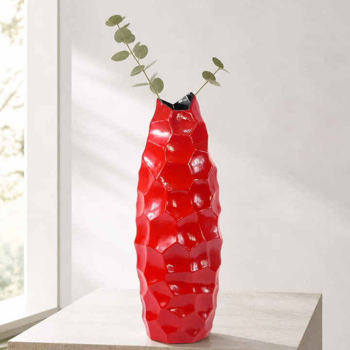 Red diamond vase with eucalyptus on pedestal