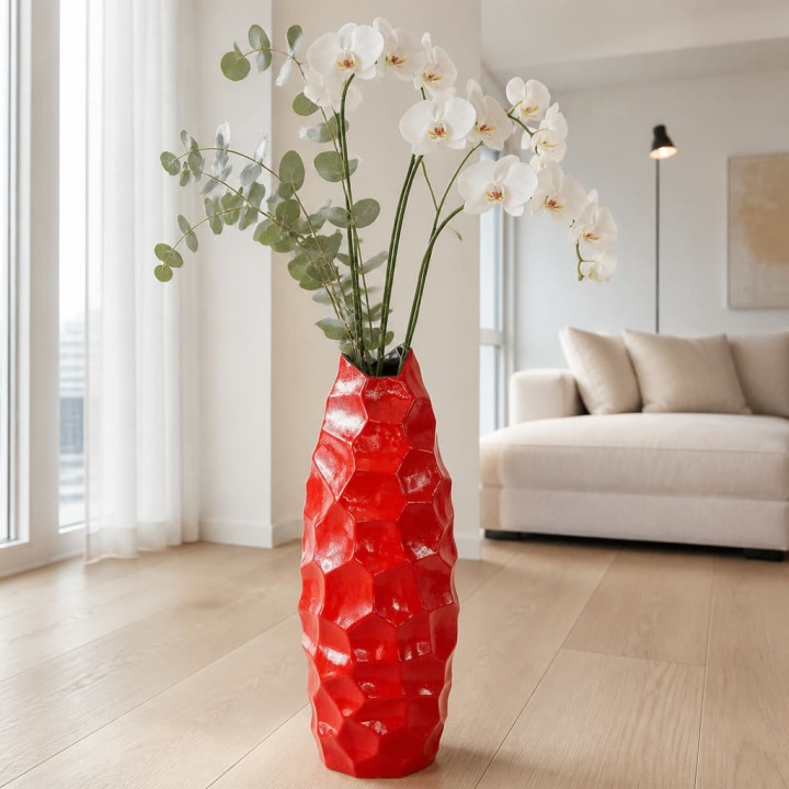 Red diamond vase on living room floor