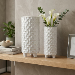 Decorative white ceramic vases texture highlighted close up