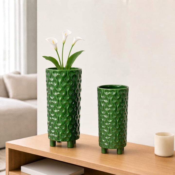 Decorative textured green ceramic vases front view