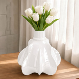 White ceramic pumpkin vase with tulips front view