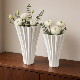 White ceramic fan vases with flowers front view