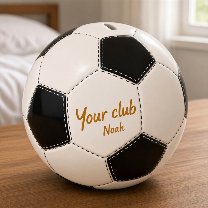 Black and white ceramic soccer ball piggy bank front view