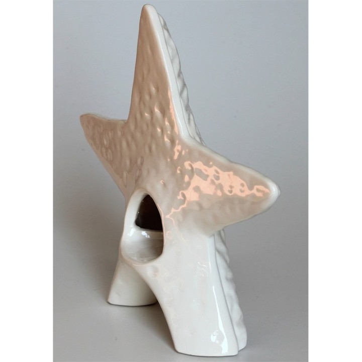 Stella portacandele di ceramica